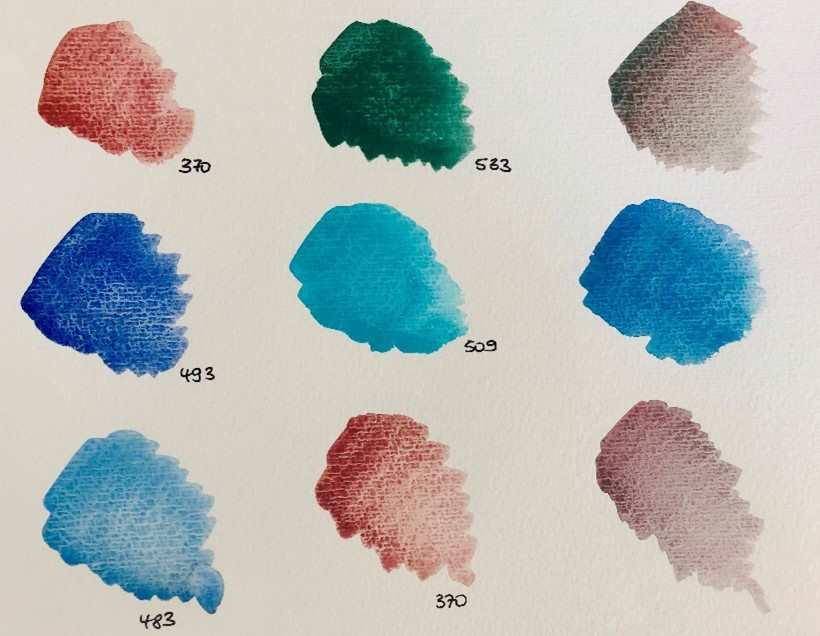 Nine colour swatches of watercolour paint