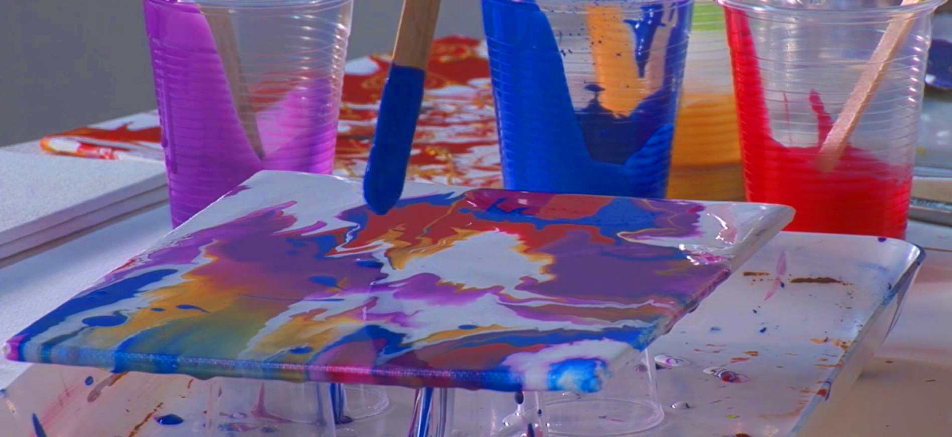 Image of acrylic pouring mediums in multiple colours